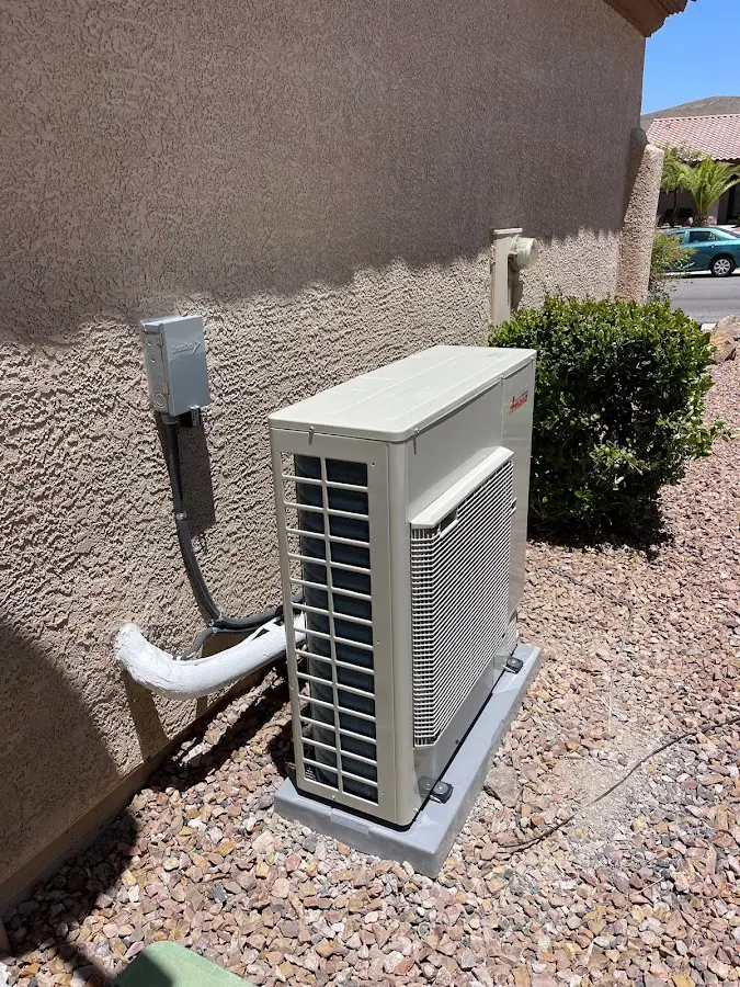 Residential air conditioning condenser unit in Tell City